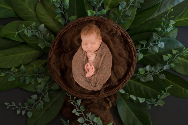 Newbornshooting eines kleinen Herzenbrechers